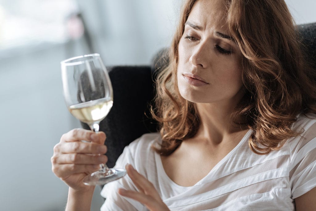 woman struggles with side effect of mixing xanax and alcohol