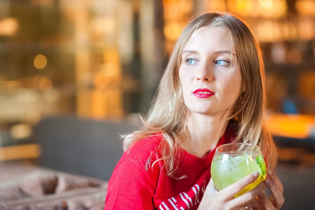 woman drinking margarita facing the Risks of Alcohol Abuse