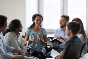 People sit and bond during group therapy while in polysubstance abuse treatment